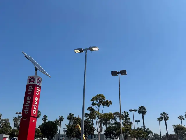 Drive Up sign posts and LED light poles in the Target Chula Vista parking lot