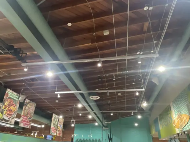 Track and linear LED lighting over the sales floor at Whole Foods Market in Laguna Beach